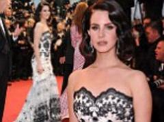 cannes film festival 2013: lana del rey fits in with the cannes opening ceremony theme as she dresses in the great gatsby-style vintage frock and hair